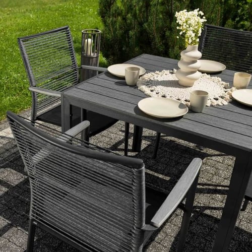 Moderner Gartentisch von di volio mit Seilstühlen und Keramikgeschirr