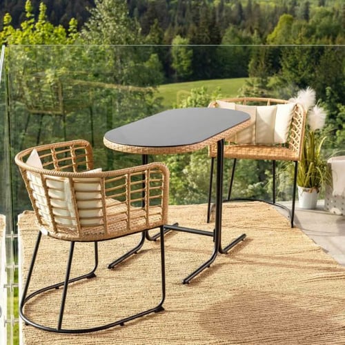 di volio Balkonmöbel Set aus Rattan mit Tisch und Stühlen auf bepflanztem Balkon